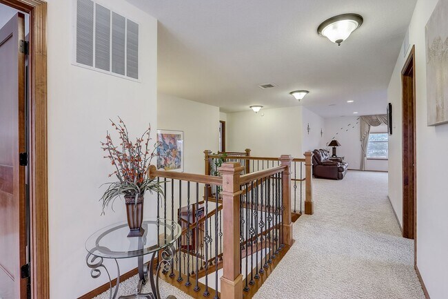 Building Photo - Grand 5 bed 4.5 bath Maple Grove Home w/ 3-Car Garage! Fully Furnished