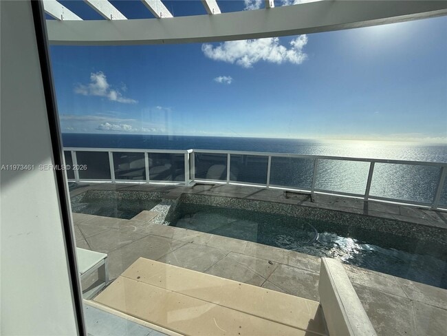 Building Photo - 18101 Collins Ave