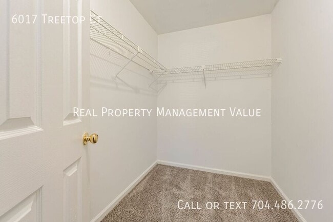 Building Photo - 6017 Treetop Ct