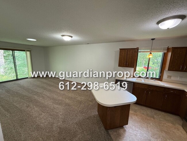 Building Photo - One Level End Unit Townhouse Available Now...