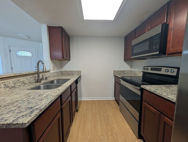 Building Photo - NOW AVAILABLE! Upgraded 3 Bedroom, 2 Bath Townhome with a Fenced yard, and close to NAS Jax and I...
