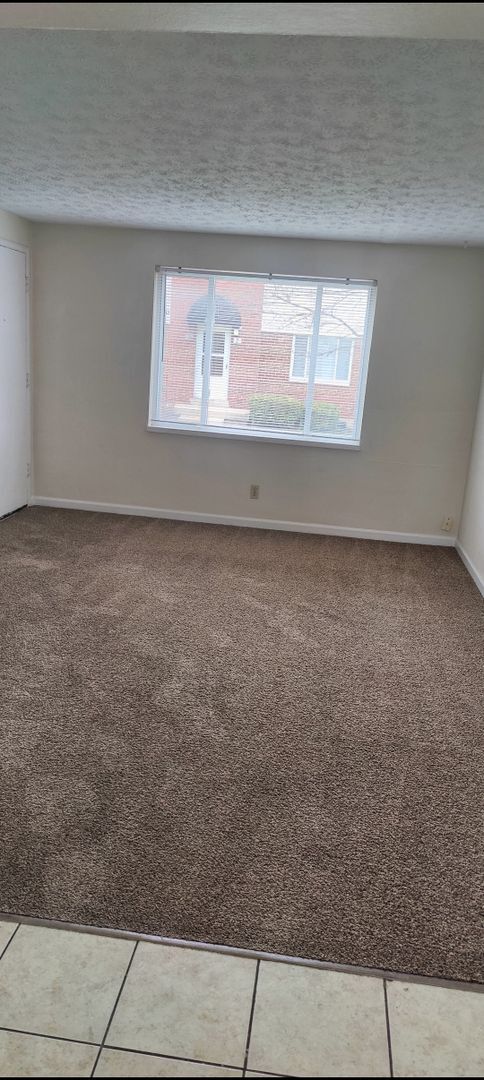Building Photo - Cozy 2 bed 1 bath  townhouse with attached...