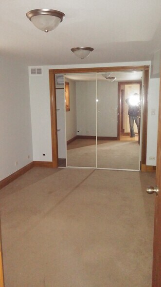 Building Photo - 5009 N Mango Ave