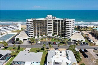 Building Photo - LIFE'S A BEACH- FULLY FURNISHED at the Nau...