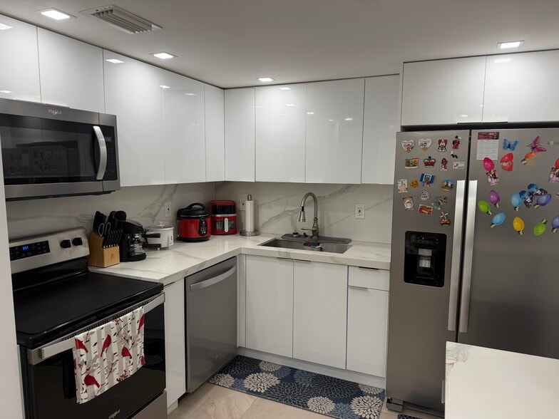 Kitchen - Full View with White Cabinetry - 5555 Collins Ave