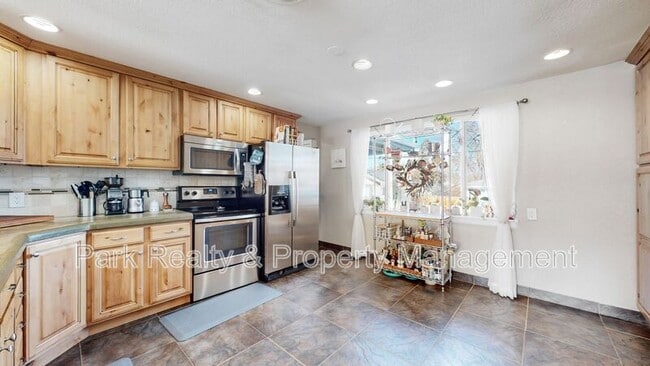 Building Photo - 6025 W 61st Ave