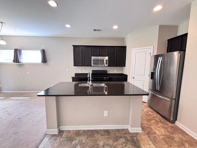 Building Photo - Modern 2-Bedroom Suite Home Near Hospitals...