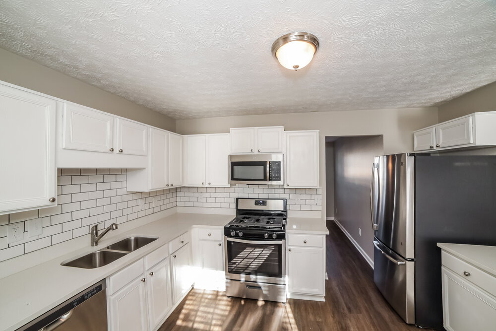 Building Photo - 7013 Grinder Dr