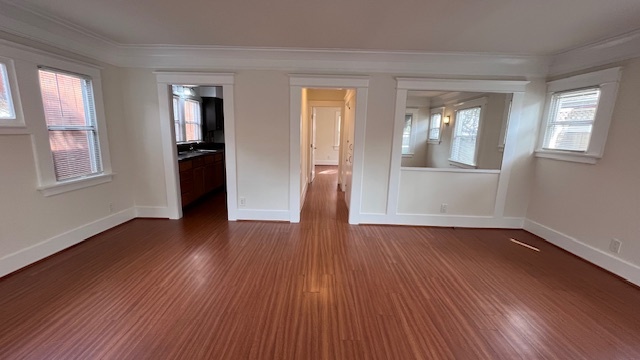 Living room looking down hallway and kitchen - 6429 Dix St