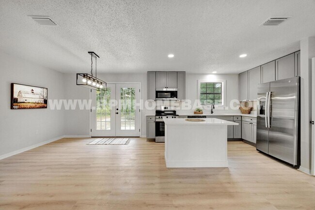 Building Photo - Fully Renovated 5-Bedroom Home with Modern...