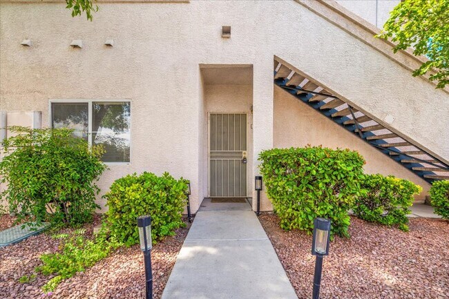 Building Photo - Charming 2-Bedroom First Floor Featuring Open Layout, Fireplace, Patio & Community Pool