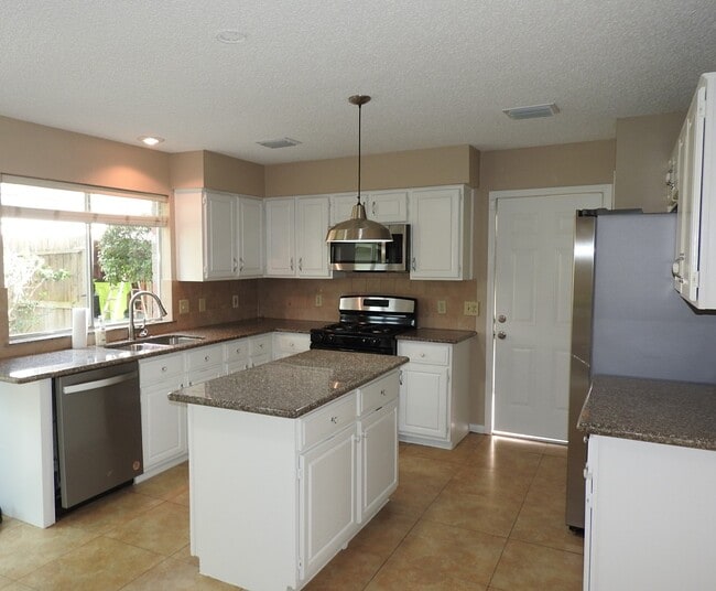 Building Photo - 3015 Cotter Lake Cir