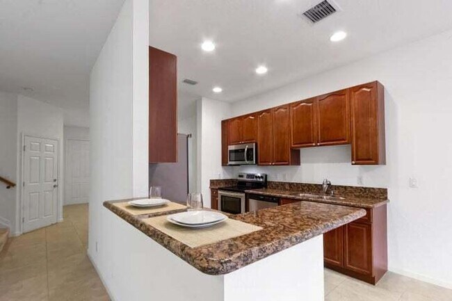 Building Photo - 6120 SE Portofino Cir
