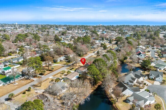 Building Photo - 4 Bed/2 Bath Furnished Single Family Home in Surfside 1 Mile to the Beach By Golf Cart!