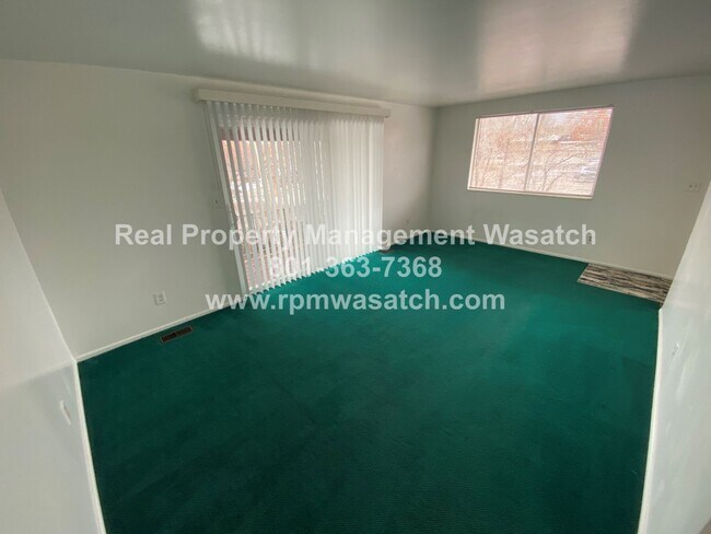 Building Photo - Come see This Charming 2 Bed 1.5 Bathroom Fourplex in Murray UT!!