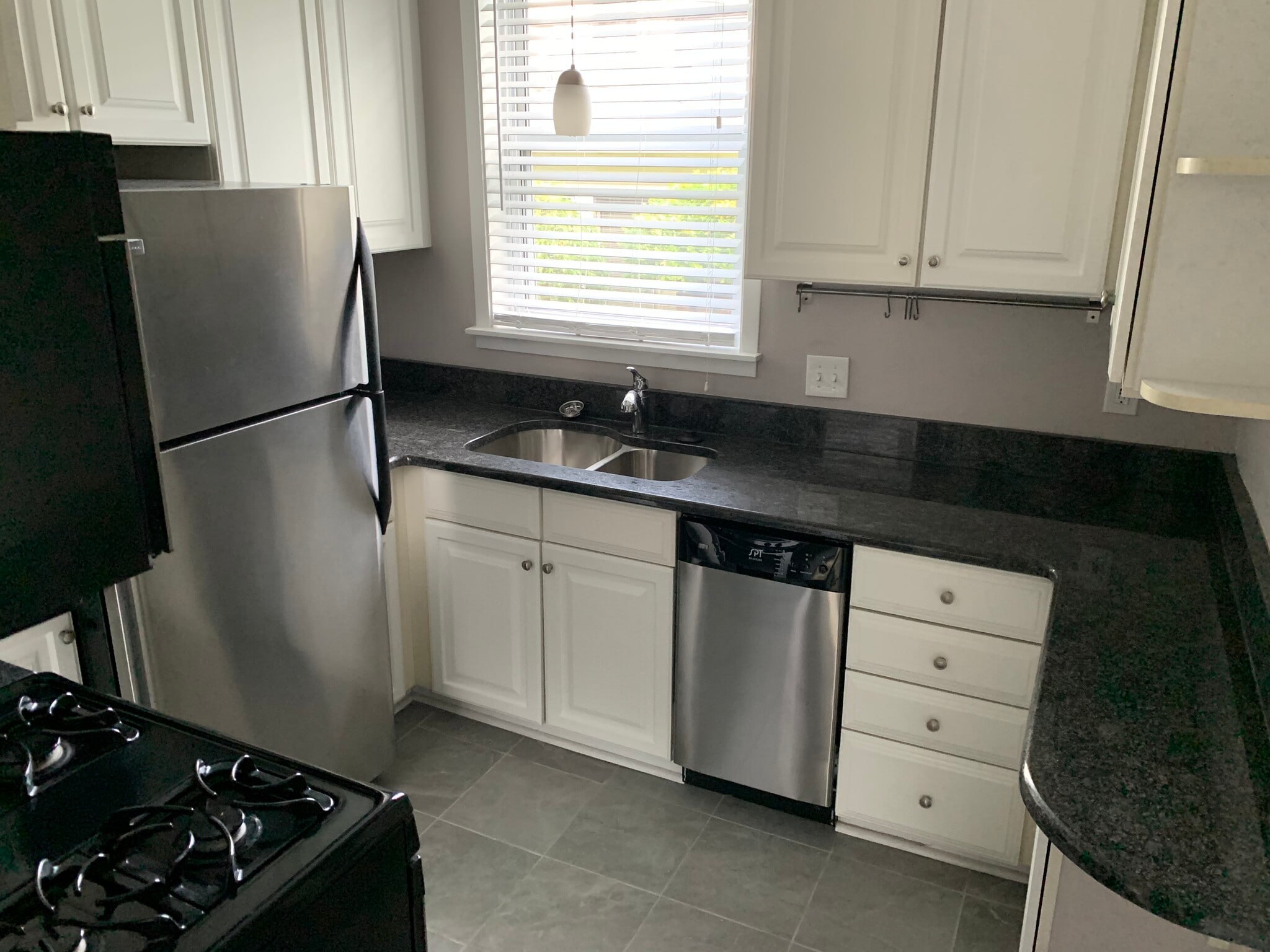 New fridge in kitchen - 166 W Lincoln St