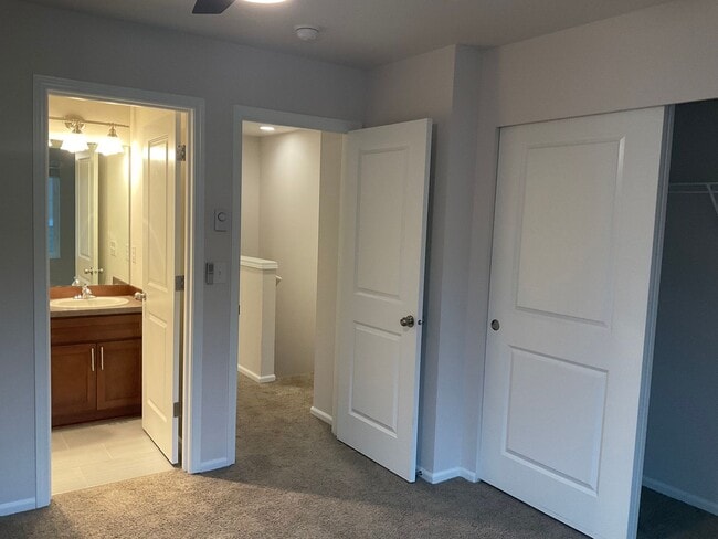 Building Photo - Riverfront Townhome with Tandem Garage & Fenced Yard