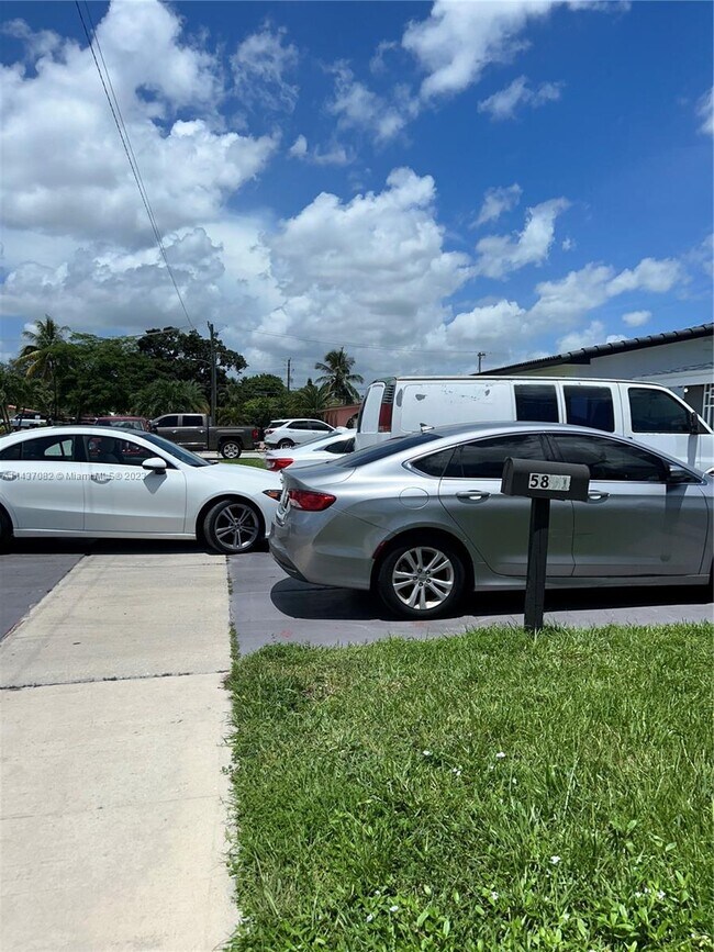 Building Photo - 5891 W 9th Ln