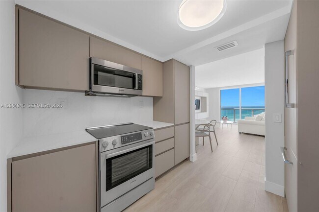Building Photo - 6365 Collins Ave
