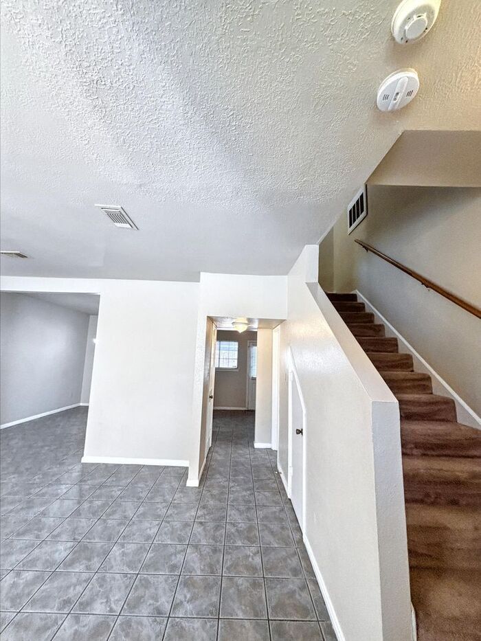Building Photo - 8310 Wild Rose St