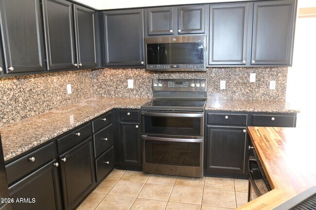Building Photo - 9345 E Caribbean Ln