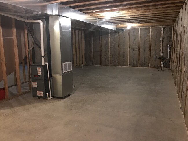 Unfinished basement w/ unilities - 100 Scenic Drive
