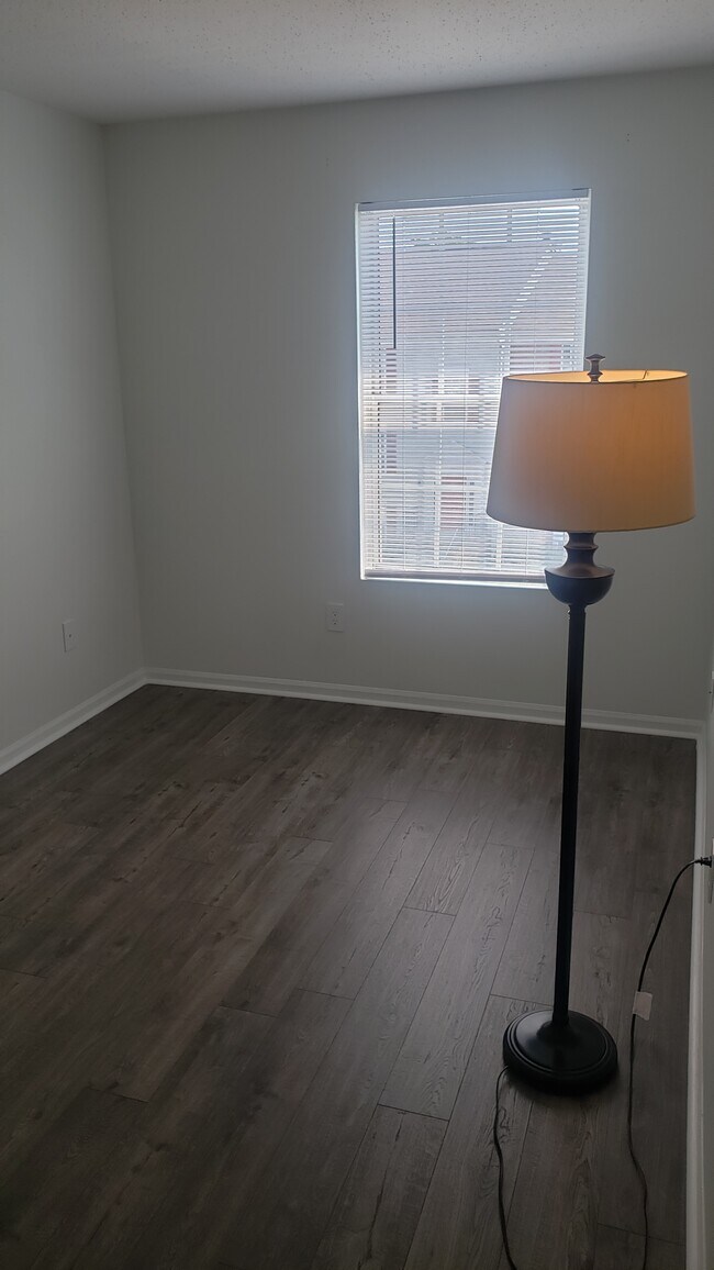 Bedroom #2 with new paint and flooring - 108 Prosperity Ave SE