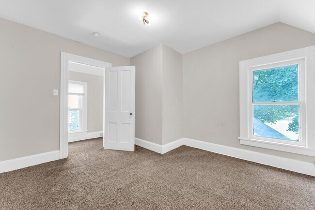 Building Photo - Charming Home with Updates and Covered Porch - A Must-See!