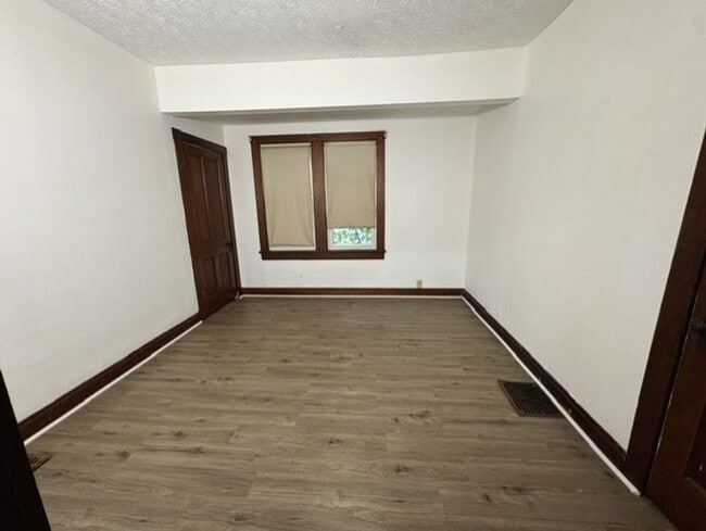 Building Photo - Updated West Akron Home with Flexible Living Space, Large Yard & Garage
