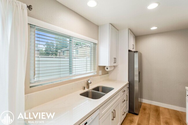 Building Photo - Two-Story Gem in Huntington Beach - Modern Upgrades & Private Outdoor Space