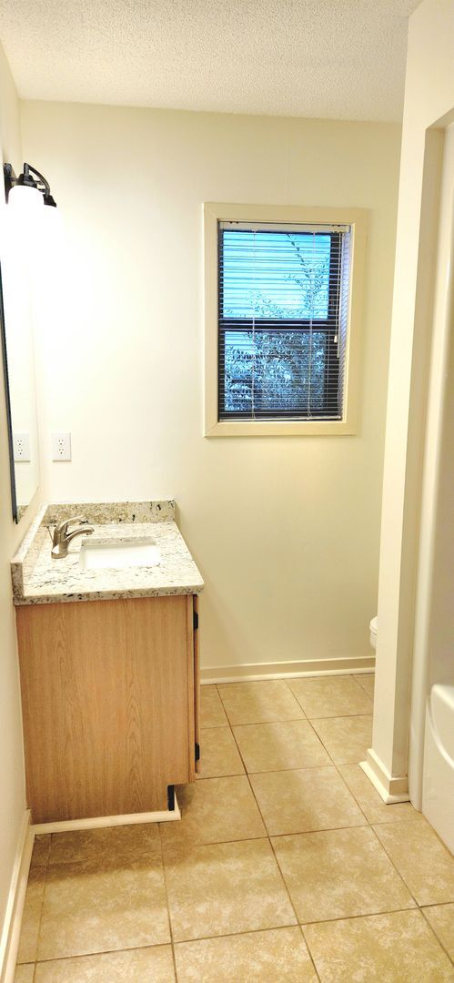 Building Photo - 6015 Caddy Cir
