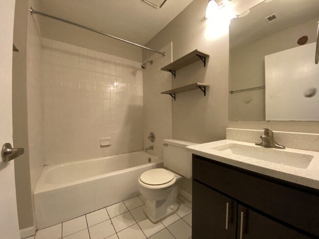 Bathroom with vanity storage and a full tub - 1732 North Dayton