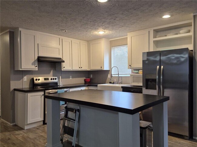 Building Photo - 6017 Whispering Pines
