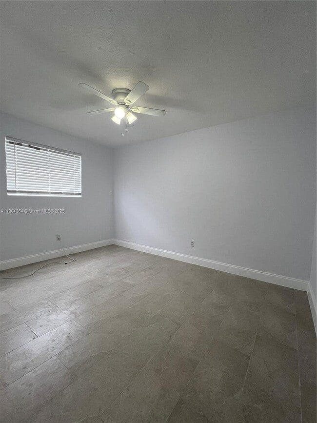 Building Photo - 5990 NE 4th Ct