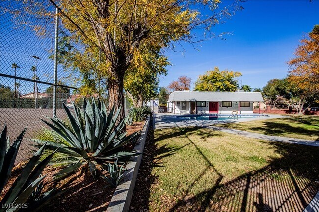 Building Photo - 319 E Pecos Way