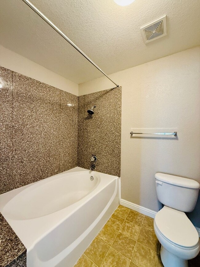 Building Photo - Fully Renovated 2-Bedroom Condo in Gated W...