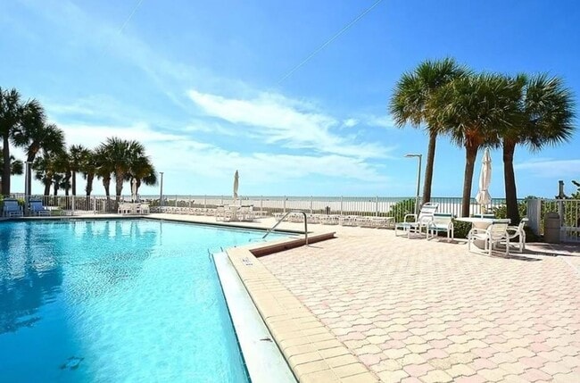 Building Photo - Newly Renovated Beachfront Condo with Stun...