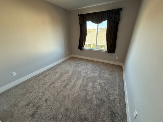 Building Photo - NEW PHOTOS! Two-level home located in Coff...