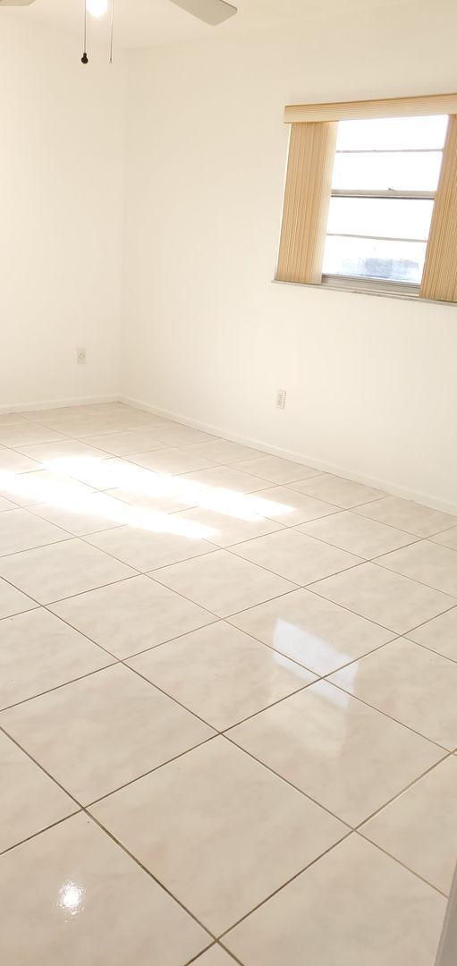 Building Photo - Charming 2 Bedroom Duplex with Tiled Flooring and Patio Space