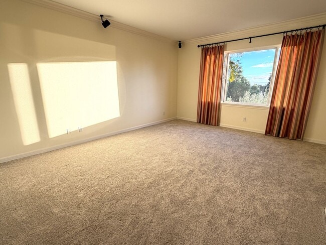 Building Photo - Enjoy warm sunsets, gentle sea breezes, and daily ocean views from this exceptional Aviara home.