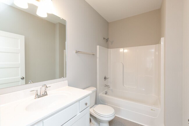 Building Photo - **BE THE LUCKY ONE TO LIVE IN THIS 2022-BUILT UPSCALE COTTAGE HOME IN THE PRESERVE AT BELLE POINTE**