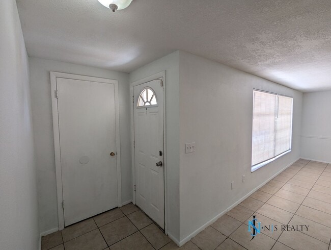 Building Photo - JUST REDUCED!!  Recently renovated 2/2/1 1...