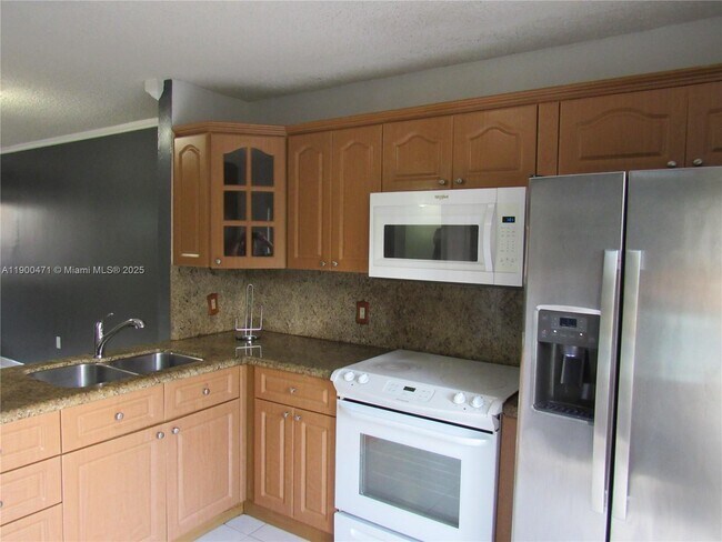 Building Photo - 5490 W 21st Ct