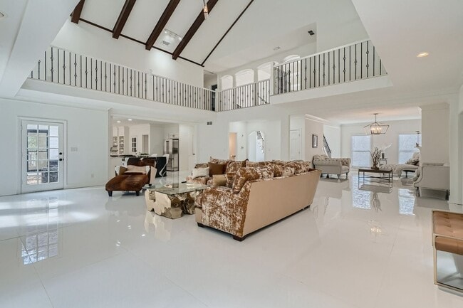 Building Photo - Furnished Estate Home - Double Curved Stairway - Marble Floors - Waterfall Island