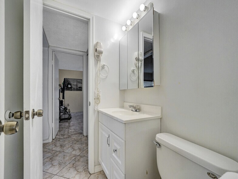 2nd bathroom half - 201 178th Dr