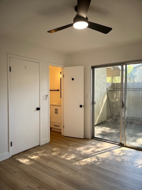 Main level bedroom with direct access to half bath and patio - 7986 Camino Kiosco