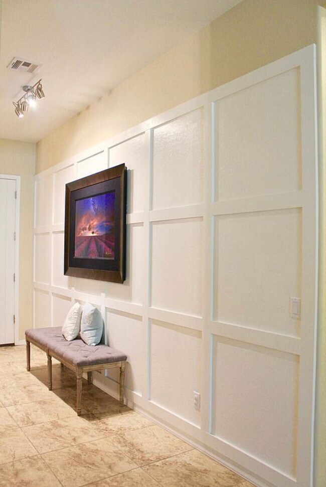 Modern wood trim wall in Entry - 20892 W Eastview Way
