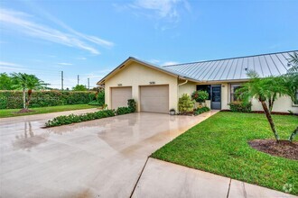 Building Photo - 7659 SE Sugar Sand Cir