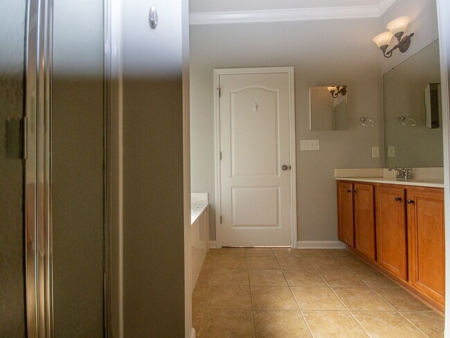 Building Photo - Gorgeous Corner-Lot Home in Canebrake Club – Lawn Care Included