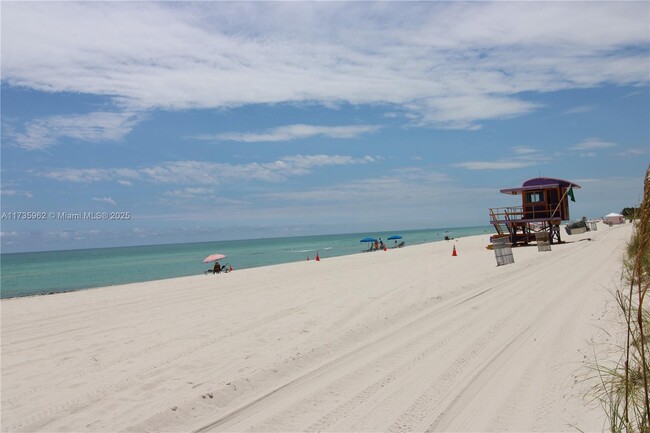 Building Photo - 5005 Collins Ave